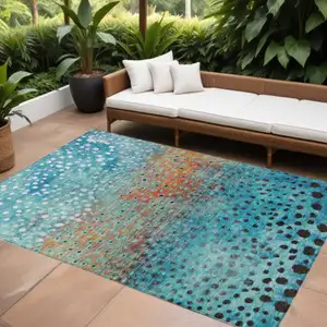 Photo of Blue Terra Cotta And Black Abstract Washable Indoor Outdoor Area Rug