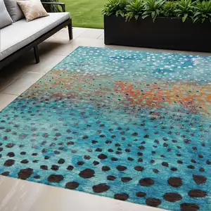 Photo of Blue Terra Cotta And Black Abstract Washable Indoor Outdoor Area Rug