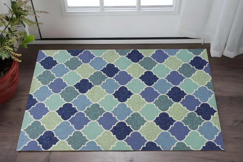 Blue Purple And Aqua Quatrefoil Hand Tufted Area Rug Photo 1