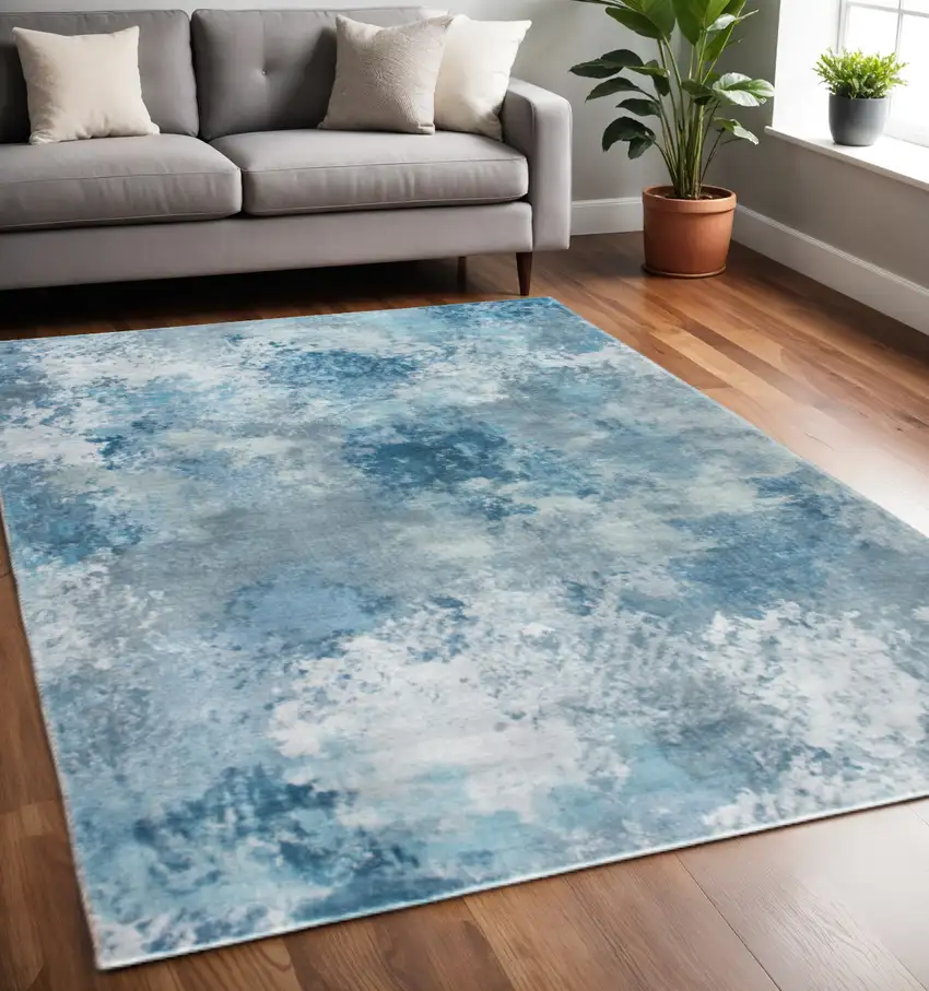 Blue And Ivory Abstract Area Rug Photo 1