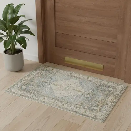 Blue Yellow And Cream Floral Medallion Distressed Washable Area Rug Photo 1