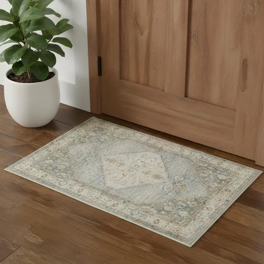 Blue Yellow And Cream Floral Medallion Distressed Washable Area Rug Photo 1