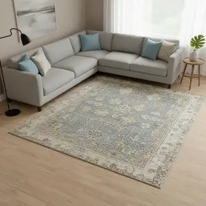 Photo of Blue Yellow And Cream Oriental Distressed Area Rug