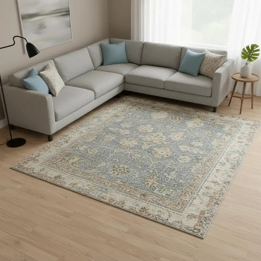 Blue Yellow And Cream Oriental Distressed Area Rug Photo 1