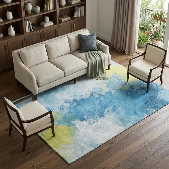 Blue Yellow And Ivory Abstract Washable Area Rug With UV Protection Photo 1