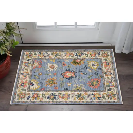 Blue Yellow And Ivory Oriental Area Rug With Fringe Photo 1
