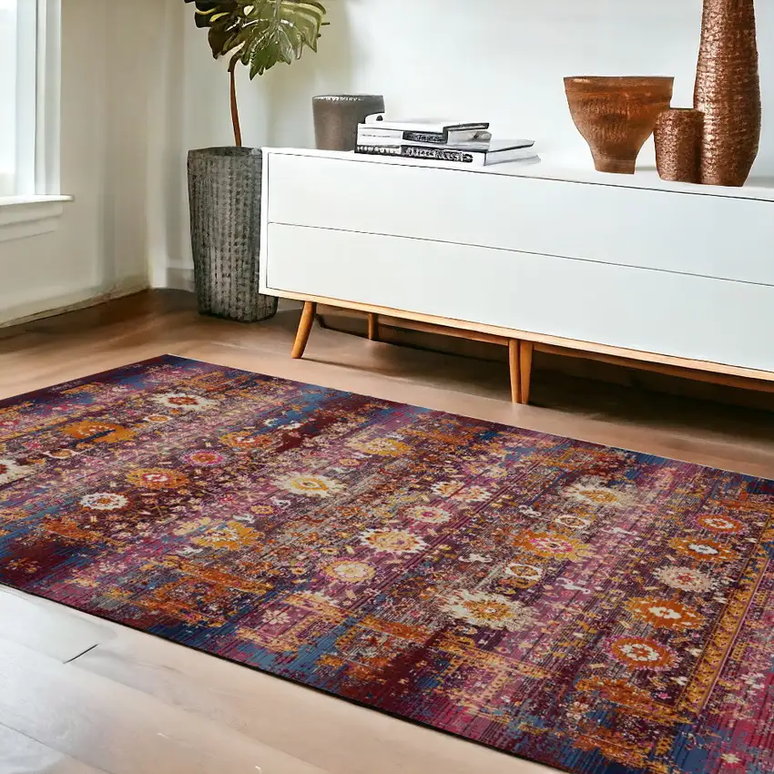 Blue Yellow And Red Floral Distressed Area Rug Photo 1