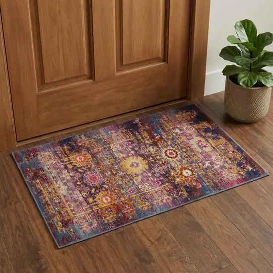Blue Yellow And Red Floral Distressed Area Rug Photo 1