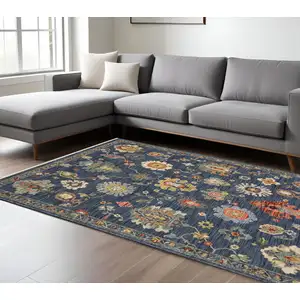 Photo of Blue Yellow And Red Oriental Area Rug With Fringe