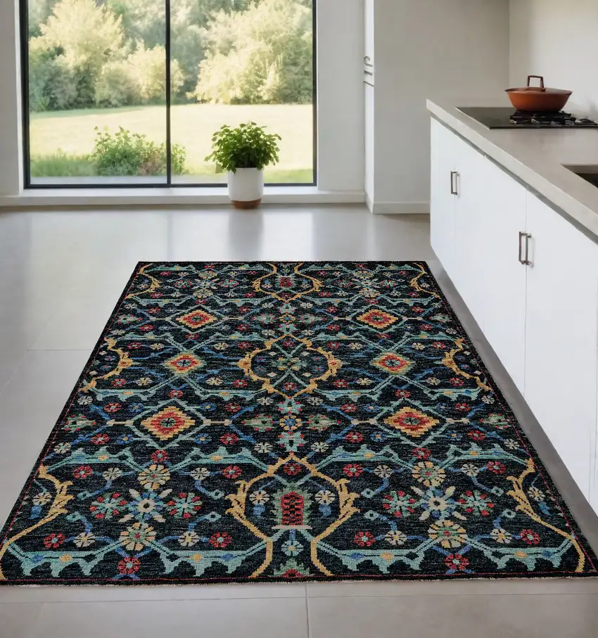 Blue Yellow And Red Wool Floral Hand Knotted Distressed Stain Resistant Area Rug With Fringe Photo 1