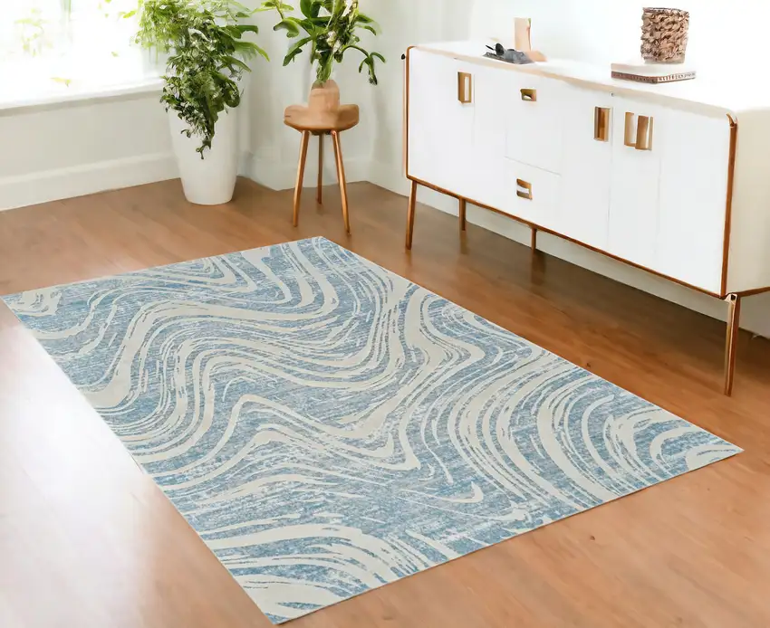 Blue and Beige Abstract Distressed Area Rug Photo 1
