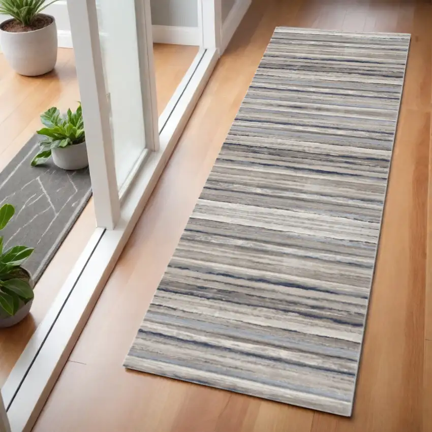 2' X 6' Blue And Beige Distressed Stripes Area Rug Photo 1