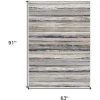 Photo of Blue and Beige Distressed Stripes Area Rug