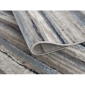 Photo of Blue and Beige Distressed Stripes Runner Rug