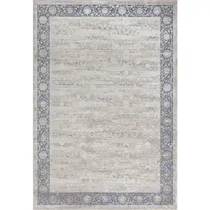 Photo of Blue and Beige Floral Area Rug
