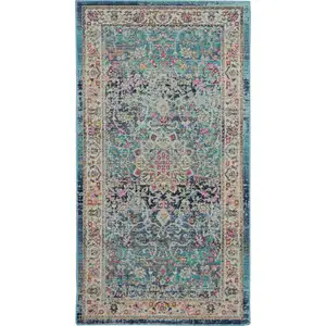 Photo of Blue and Beige Floral Distressed Area Rug