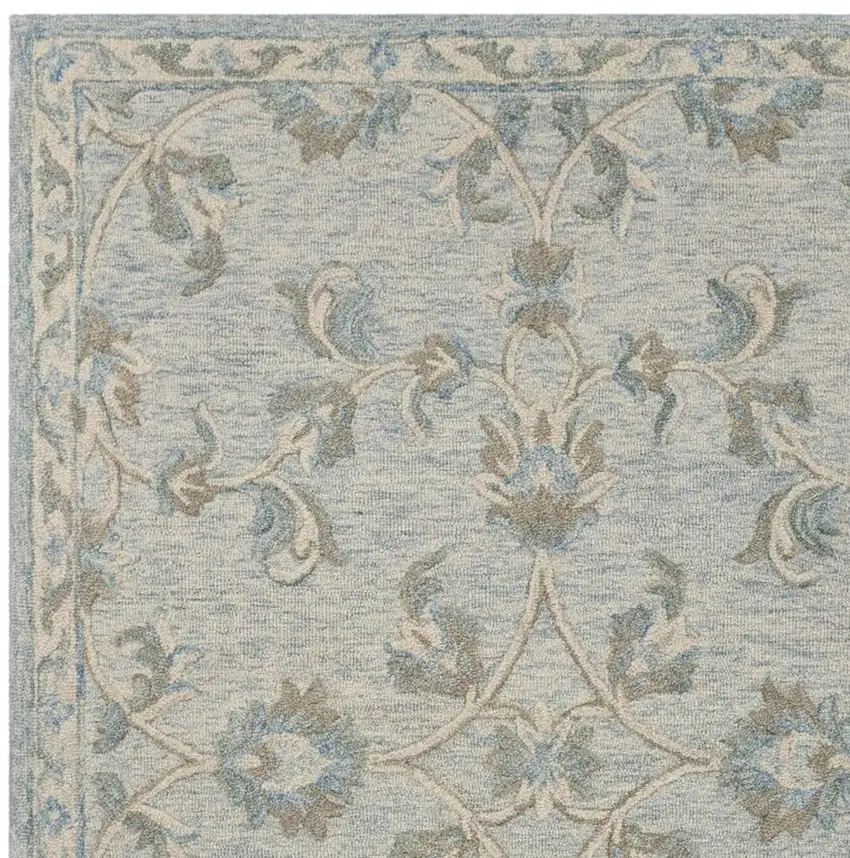 Blue And Ivory Wool Hand Tufted Area Rug Photo 3