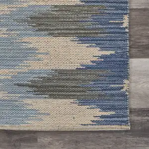 Photo of Blue and Cream Ikat Pattern Area Rug
