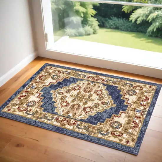 Blue and Gold Medallion Power Loom Distressed Area Rug Photo 1