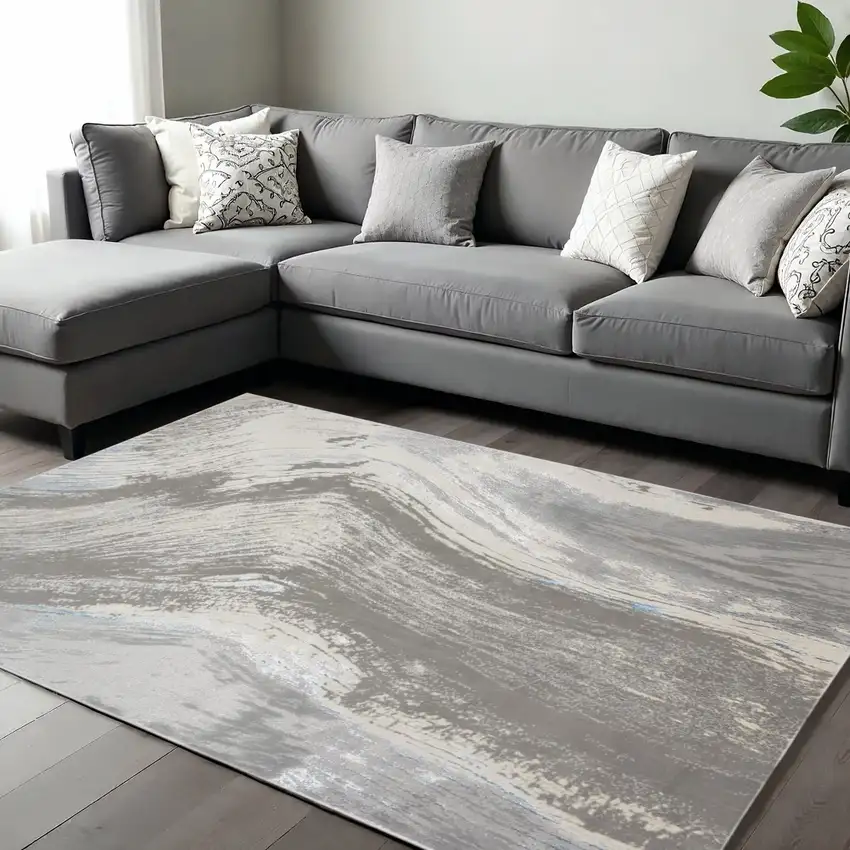 Gray Ivory And Blue Abstract Area Rug Photo 1