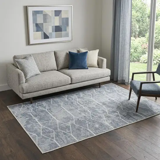 5' X 7' Blue and Gray Geometric Power Loom Washable Area Rug Photo 1