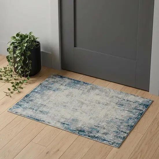 Blue and Ivory Abstract Area Rug Photo 1