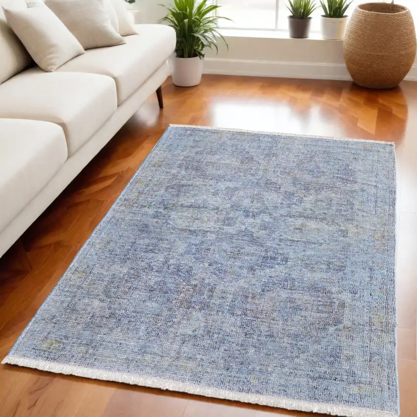 Blue and Ivory Abstract Hand Woven Distressed Area Rug With Fringe Photo 1