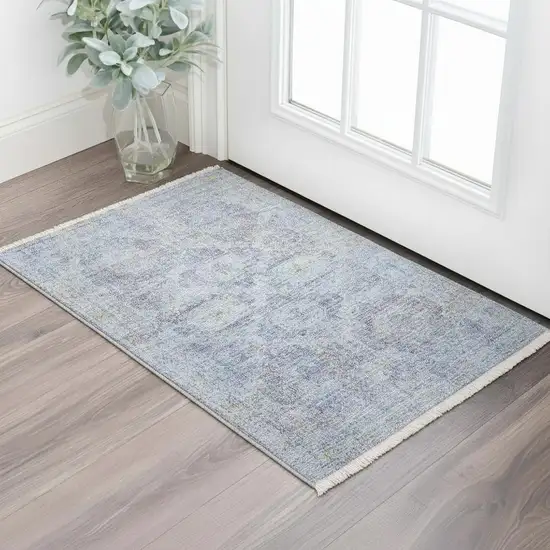 Blue and Ivory Abstract Hand Woven Distressed Area Rug With Fringe Photo 1