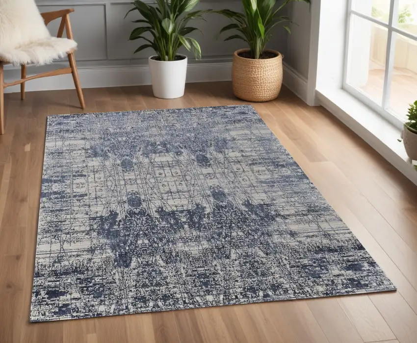 Blue and Ivory Abstract Hand Woven Worn Faded Area Rug Photo 1