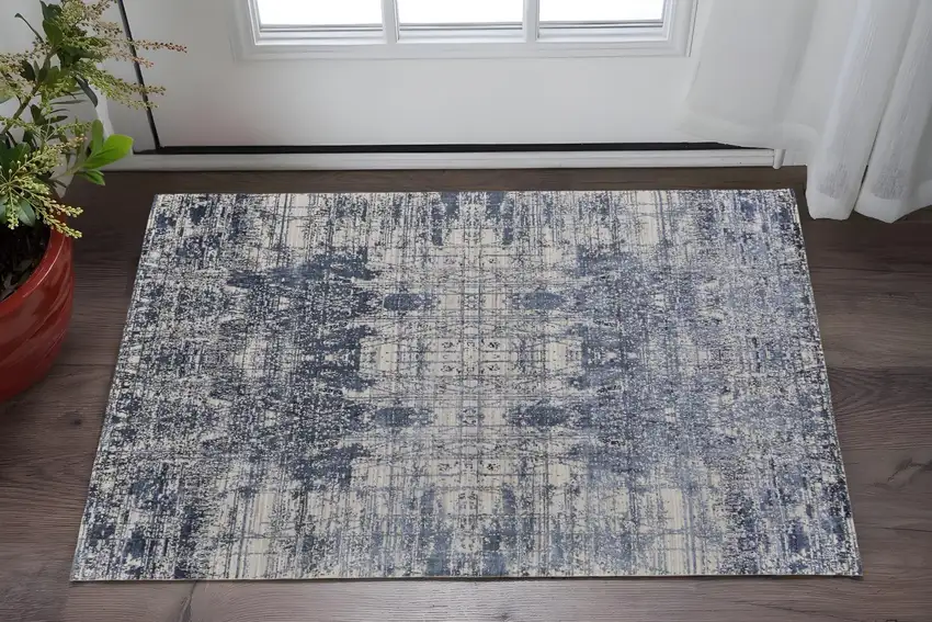 Blue and Ivory Abstract Hand Woven Worn Faded Area Rug Photo 1