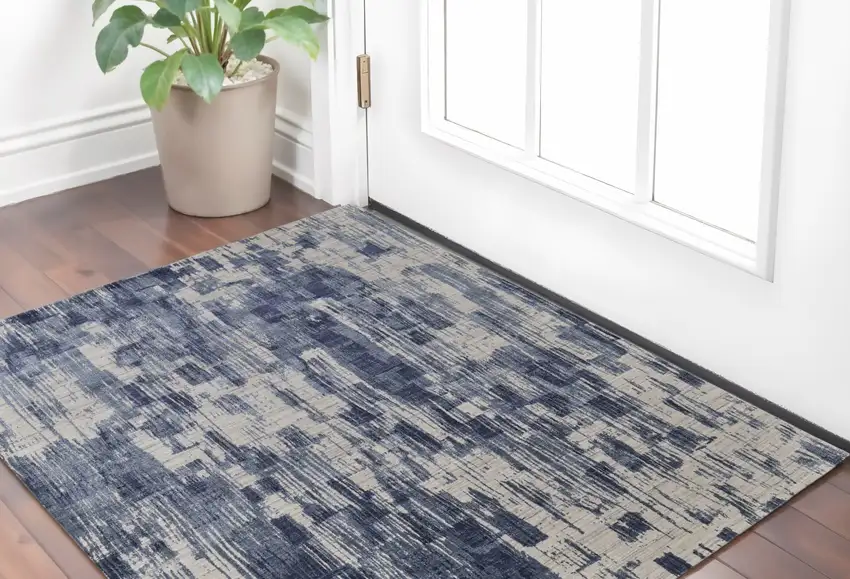 Blue and Ivory Abstract Hand Woven Worn Faded Area Rug Photo 1
