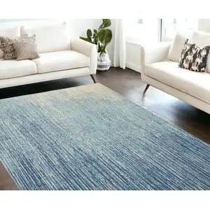Photo of Blue and Ivory Abstract Power Loom Area Rug