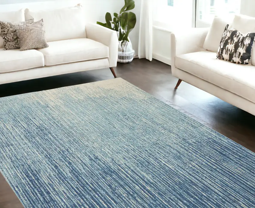 Blue and Ivory Abstract Power Loom Area Rug Photo 1