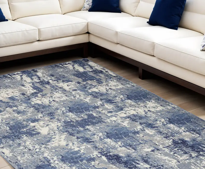 Blue and Ivory Abstract Power Loom Area Rug Photo 1