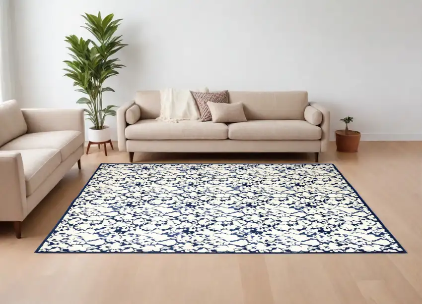 Blue and Ivory Abstract Power Loom Area Rug Photo 1