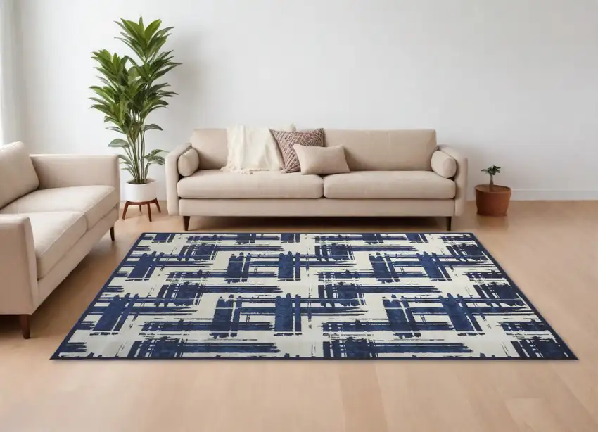 Blue and Ivory Abstract Power Loom Area Rug Photo 1