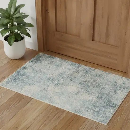 Blue and Ivory Abstract Power Loom Washable Area Rug Photo 1