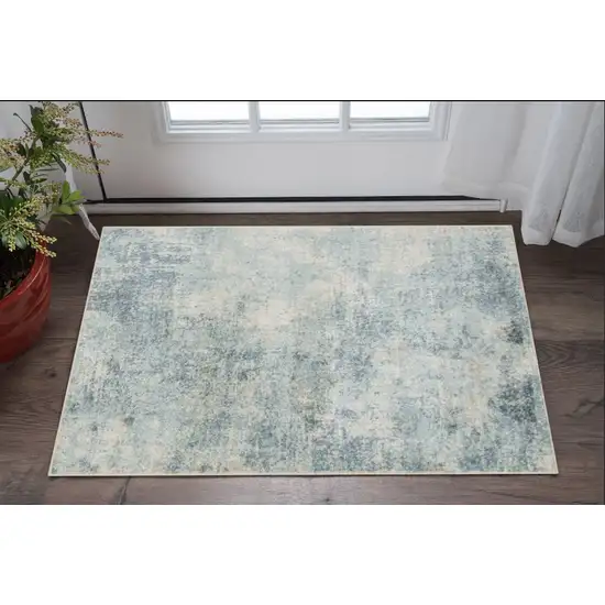 Blue and Ivory Abstract Power Loom Washable Area Rug Photo 1