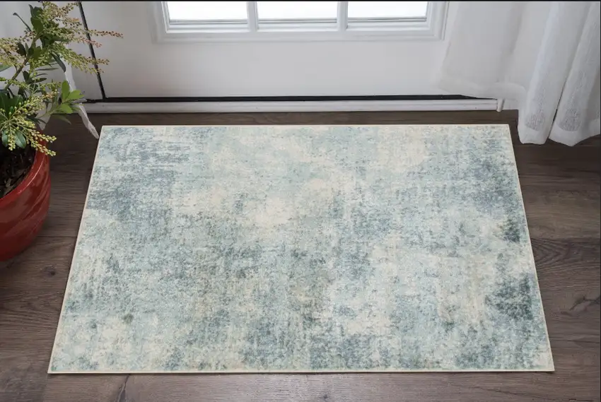 Blue and Ivory Abstract Power Loom Washable Area Rug Photo 1