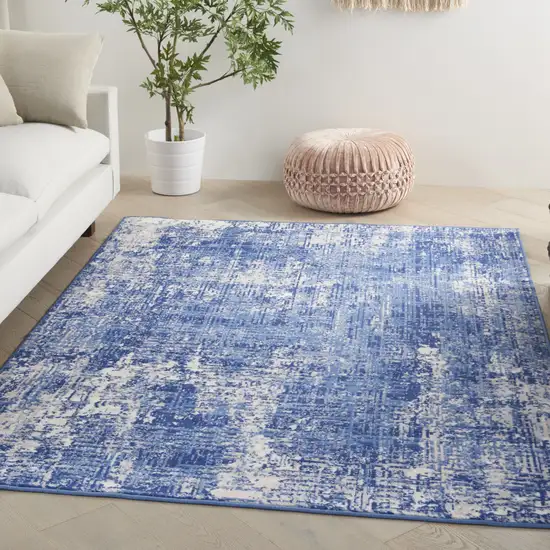 Blue And Ivory Abstract Distressed Area Rug Photo 5