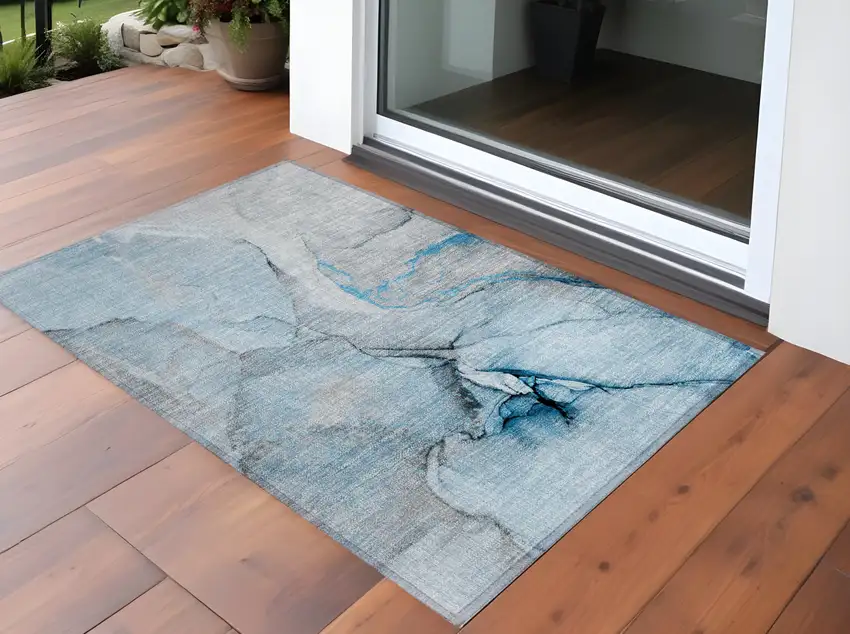 Blue and Ivory Abstract Washable Non Skid Indoor Outdoor Area Rug Photo 1