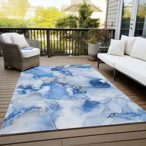 Photo of Blue and Ivory Abstract Washable Non Skid Indoor Outdoor Area Rug