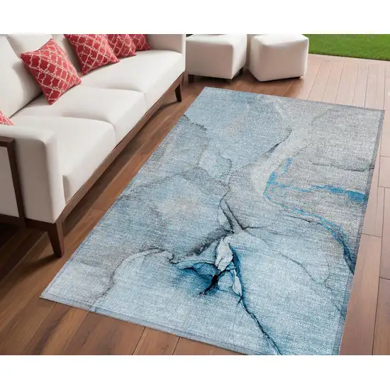 Blue and Ivory Abstract Washable Non Skid Indoor Outdoor Area Rug Photo 1