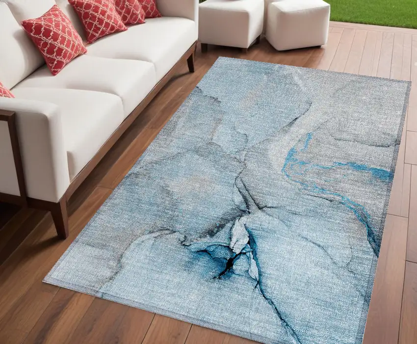 Blue and Ivory Abstract Washable Non Skid Indoor Outdoor Area Rug Photo 1