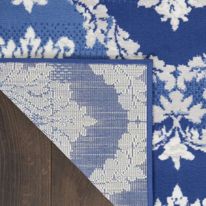 Blue And Ivory Damask Distressed Area Rug Photo 9