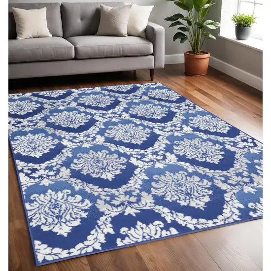 Blue And Ivory Damask Distressed Area Rug Photo 2
