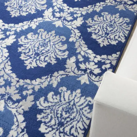 Blue And Ivory Damask Distressed Area Rug Photo 9