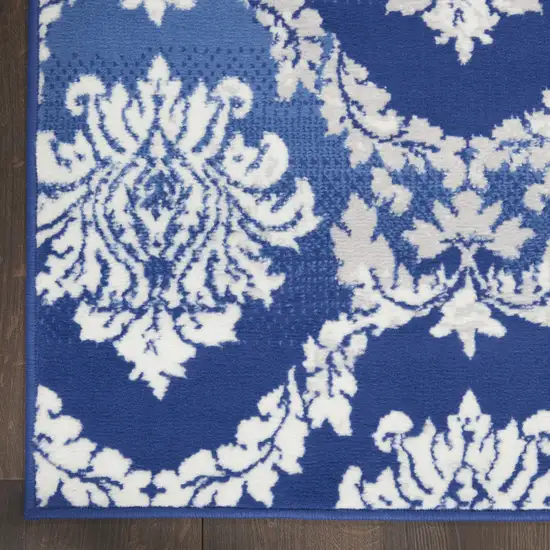 Blue And Ivory Damask Distressed Area Rug Photo 8