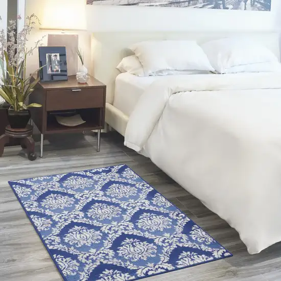Blue and Ivory Damask Distressed Area Rug Photo 7