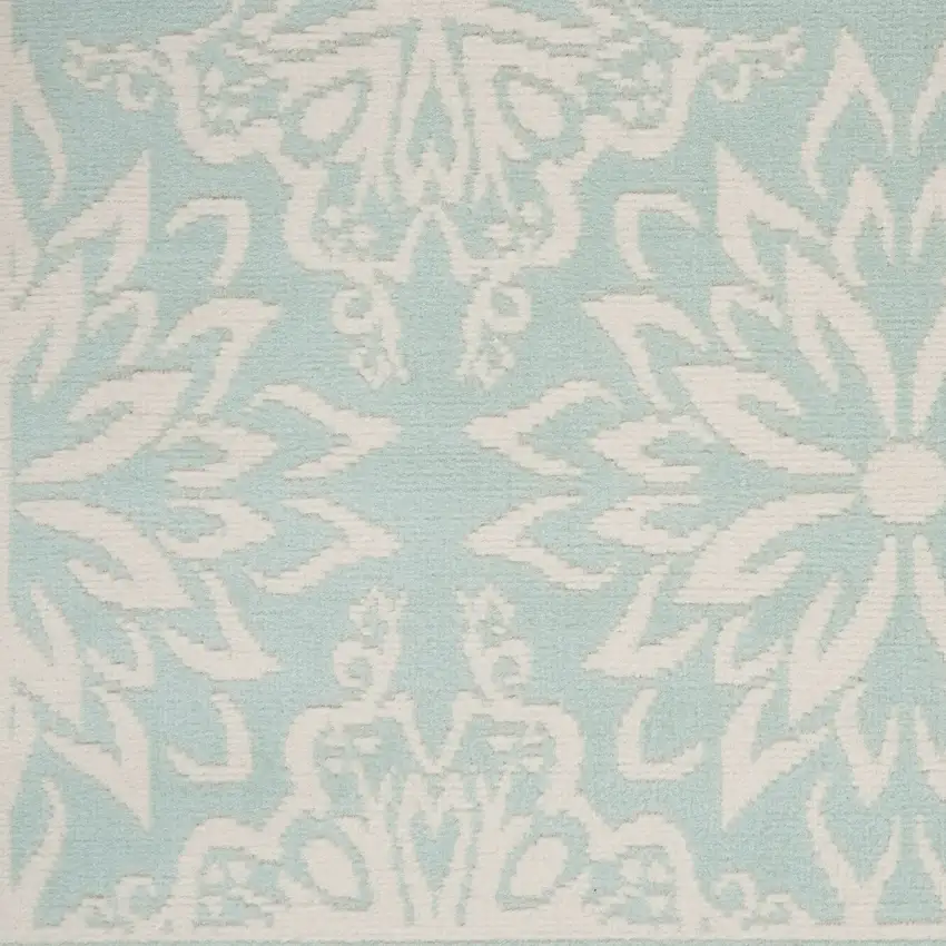 Blue and Ivory Floral Medallion Power Loom Area Rug Photo 1